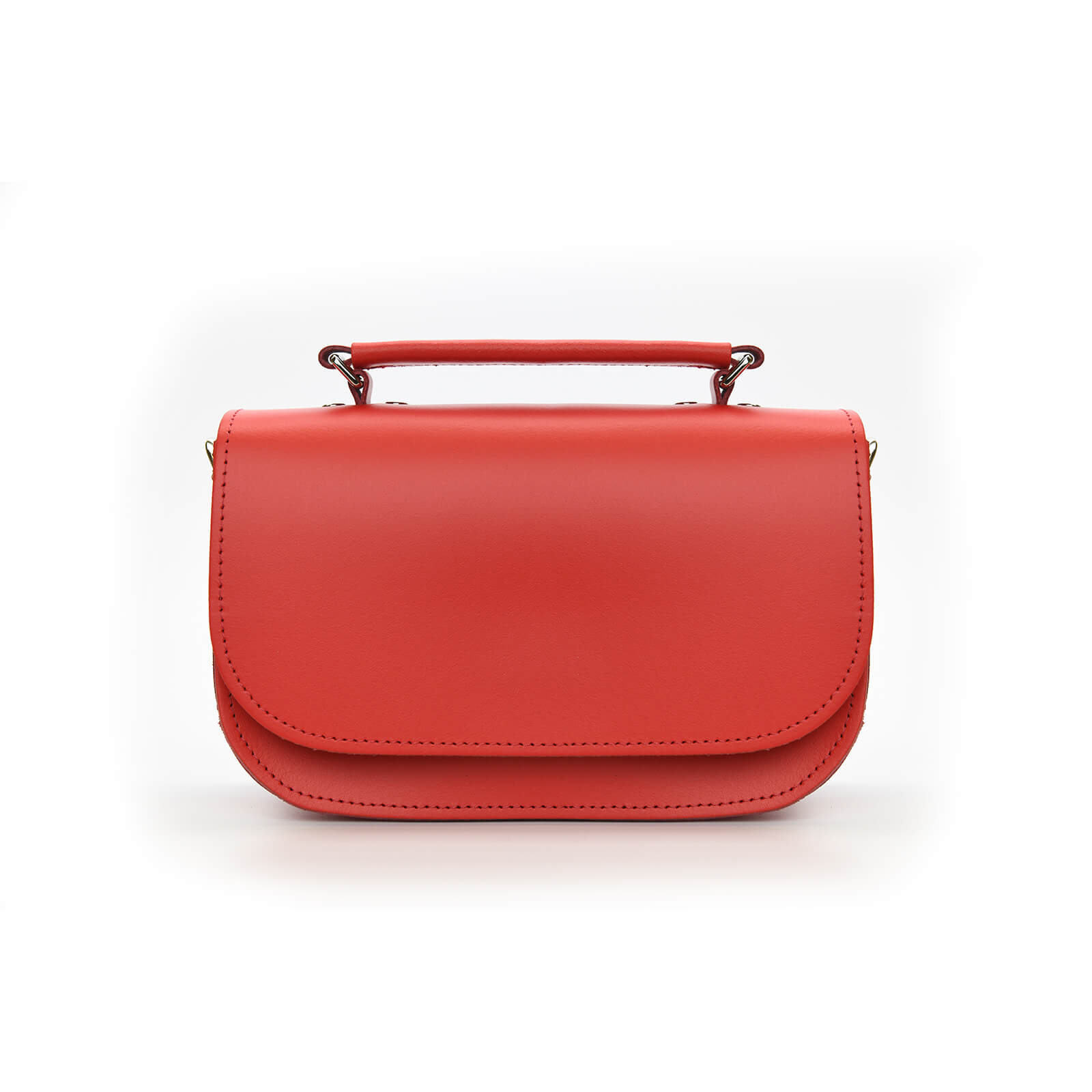 A pillar box red handmade leather handbag with a sleek design and silver nickel detailing.