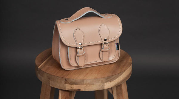 A Zatchels handmade leather handbag on a stool looking pristine