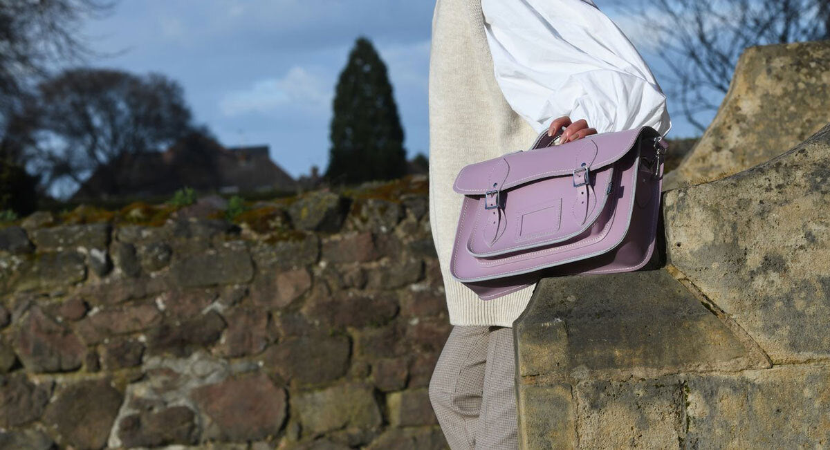 Turquoise-coloured Zatchels Handmade leather satchel on a stone wall