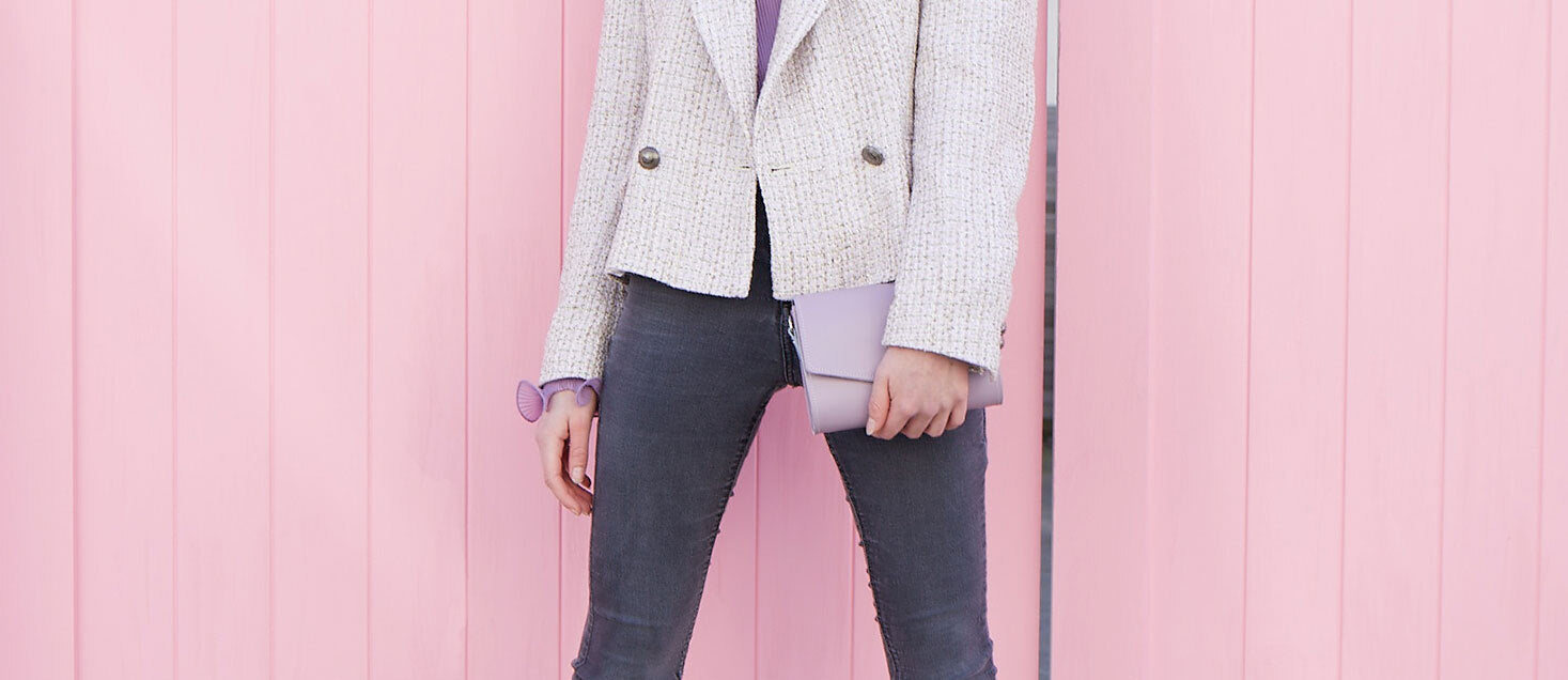 Woman Holding A Zatchels Handmade Leather Clutch Bag in blue