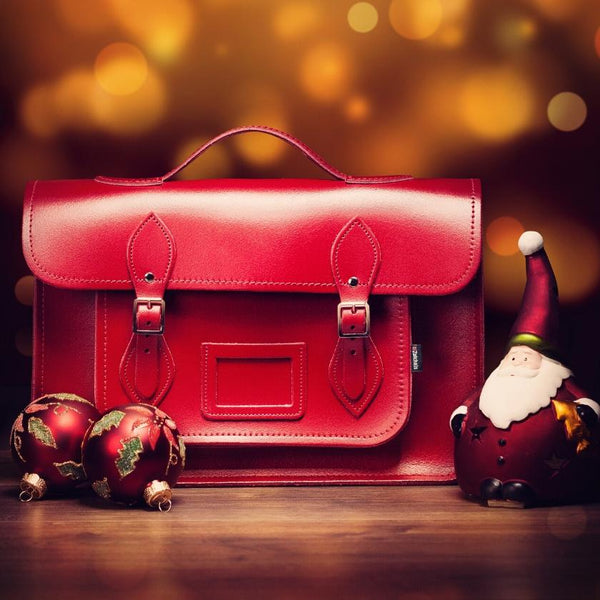 handmade leather satchel in Red on a festive background
